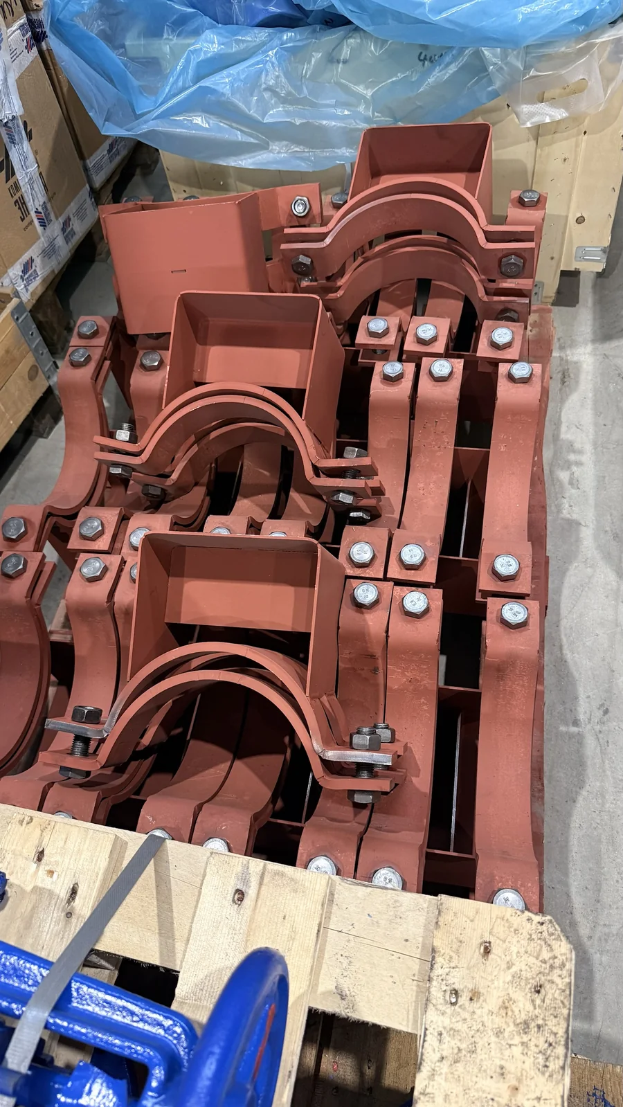 Clamp pipe supports 219-KH-A11 to OST 36-146-88 on a pallet